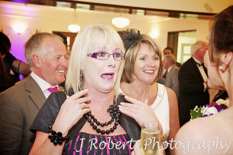 excited guest with bride at wedding - wedding photography sydney